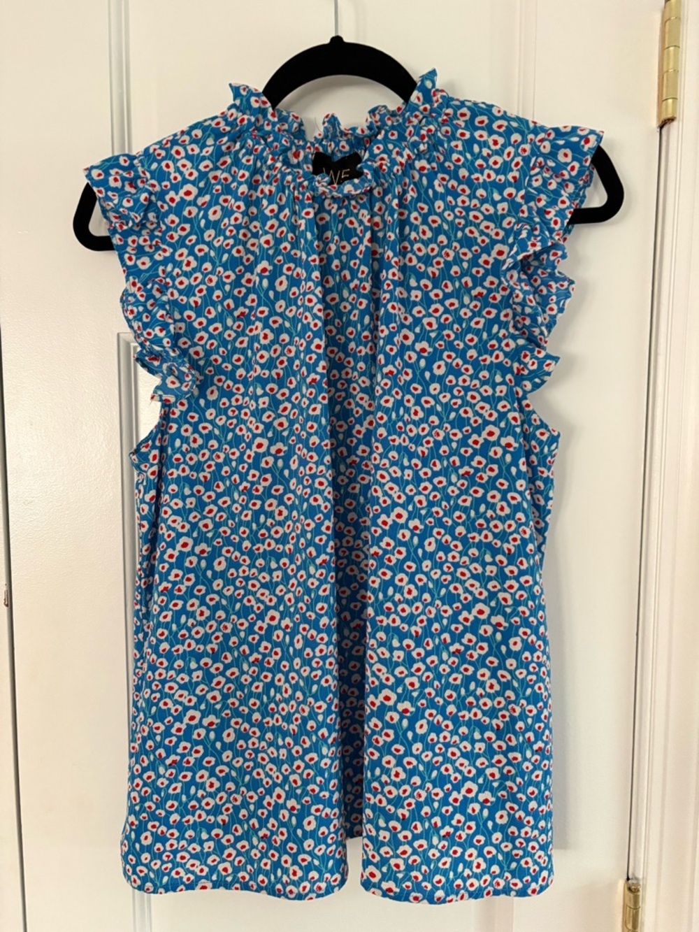 Summer light blue top with red and white flowers
